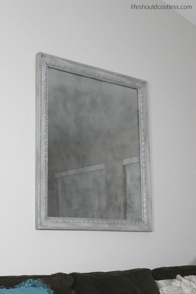 Huge print in frame turned faux antique mirror. After. Full mirror.