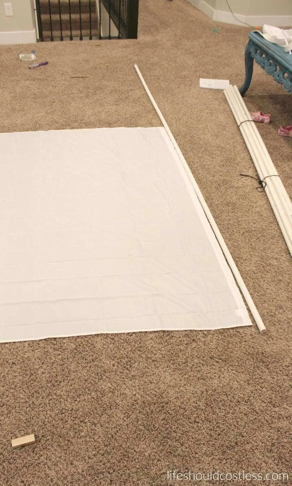 Multi-Use PVC Theater with washable and glow-in-the-dark backdrop options. The "thneed" of PVC theaters! It is so veratile that you can do almost anything. Best PVC project for kids. Showing where to make the first cut.