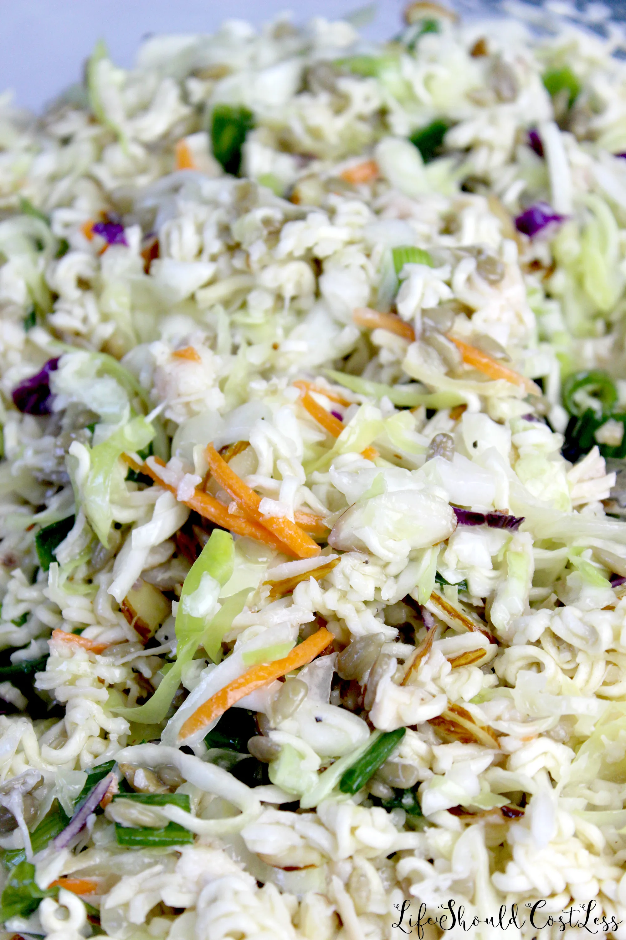 How to make oriental chicken salad with top ramen noodles and coleslaw.
