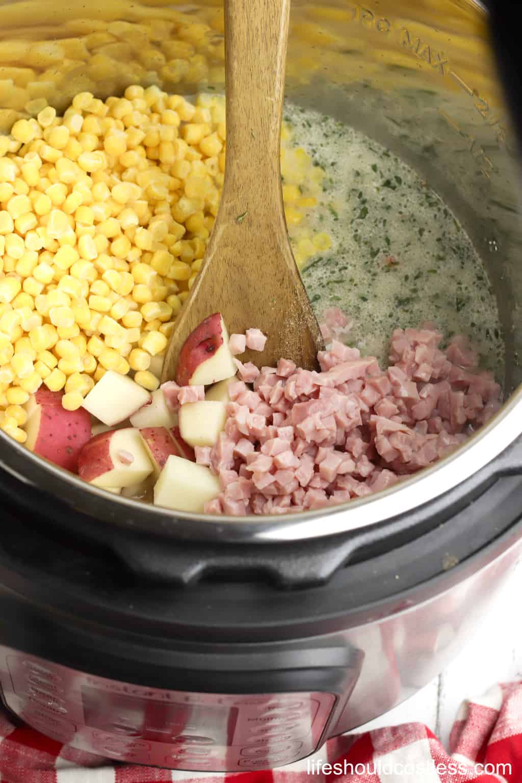 5. Ham & Potato Soup Directions Adding the corn, ham, and potato's.