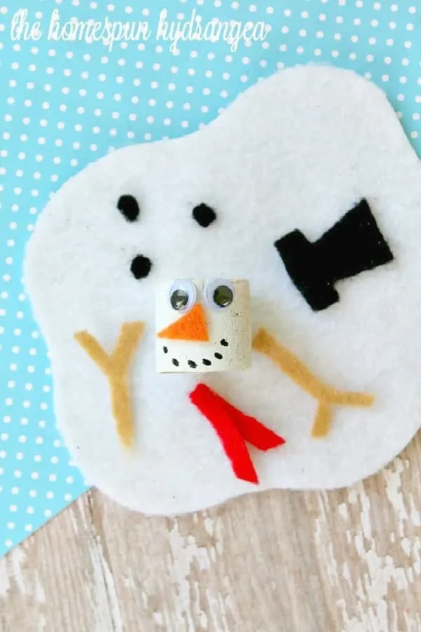 Melted-Snowman-Wine-Cork-Craft-for-Kids snowman crafts for kids