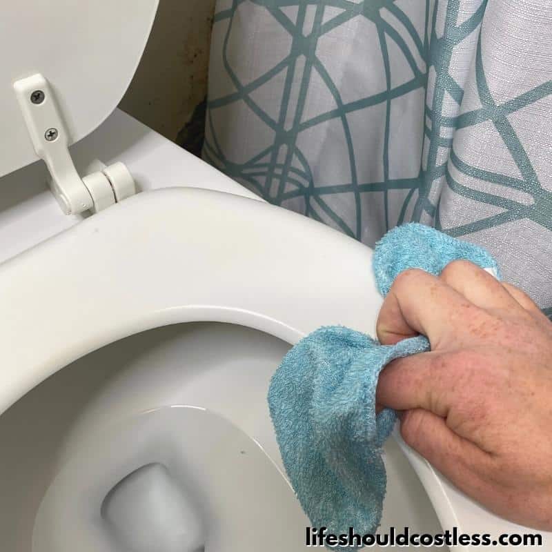 Toilet cleaning and disinfecting with vinegar Step 4 B